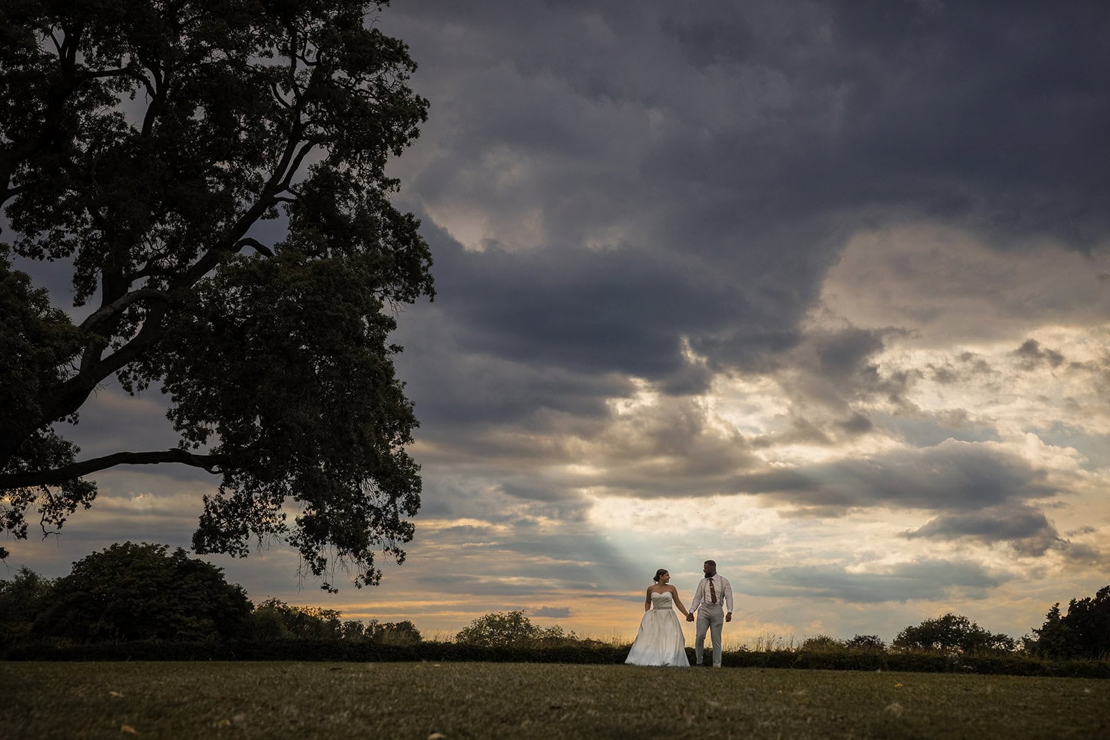 Braxted Park Recommended Photographer Scott Miller captures this stunning bride and groom dusk portrait